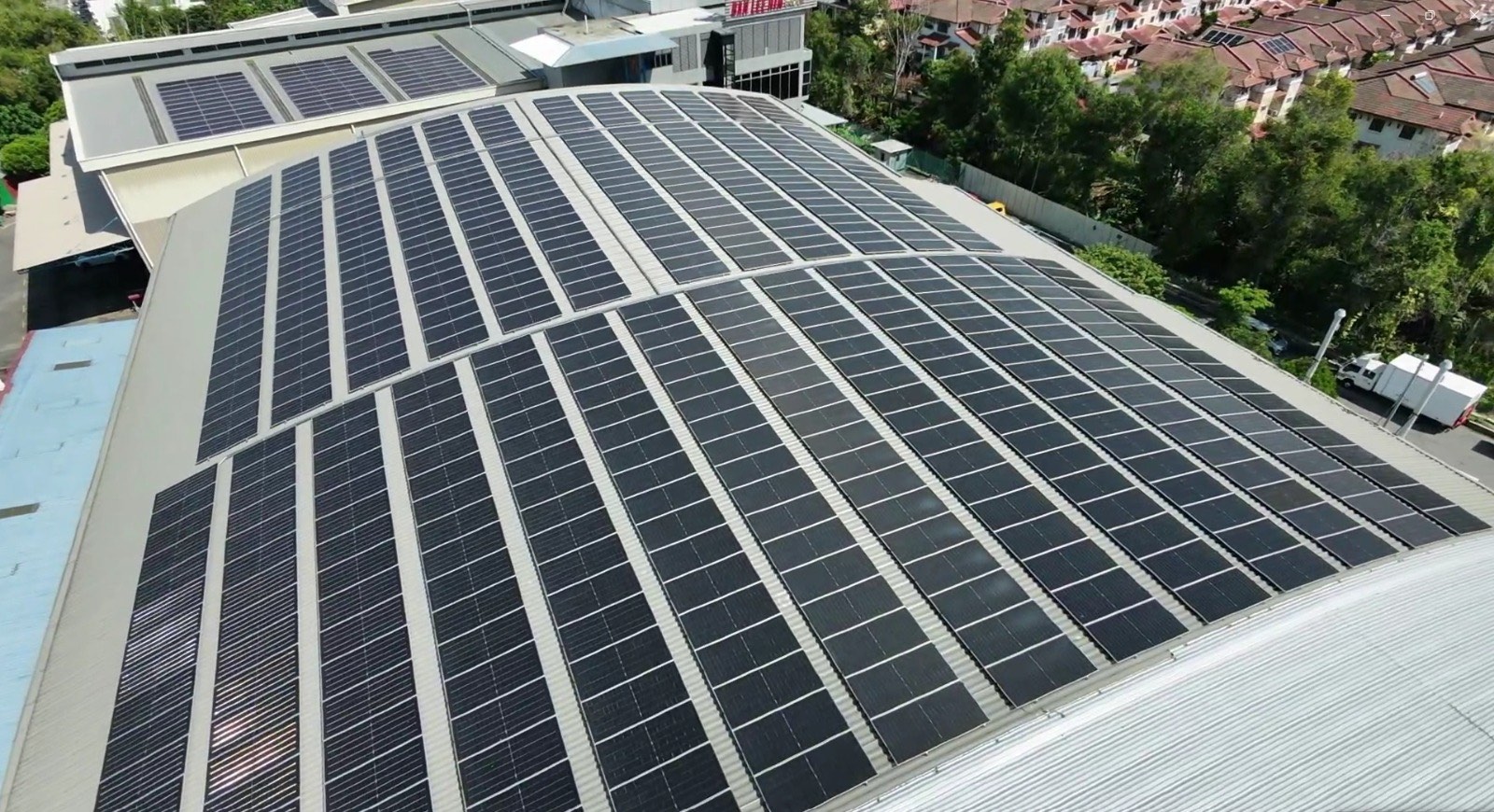 Aerial view of a large rooftop solar installation by SS Solar